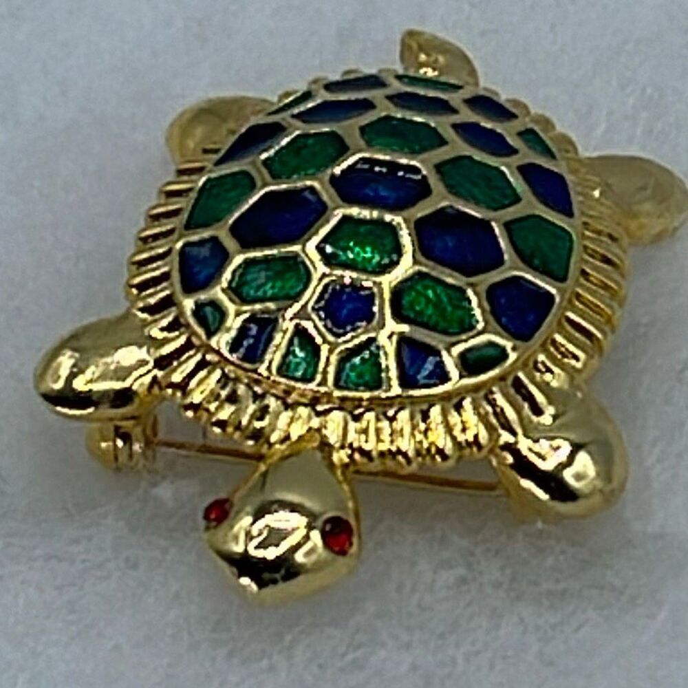 Vintage red eyed enameled sea turtle brooch.